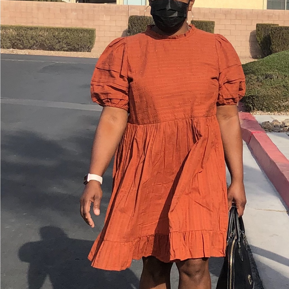 Rust colored dress pleated size L gently used